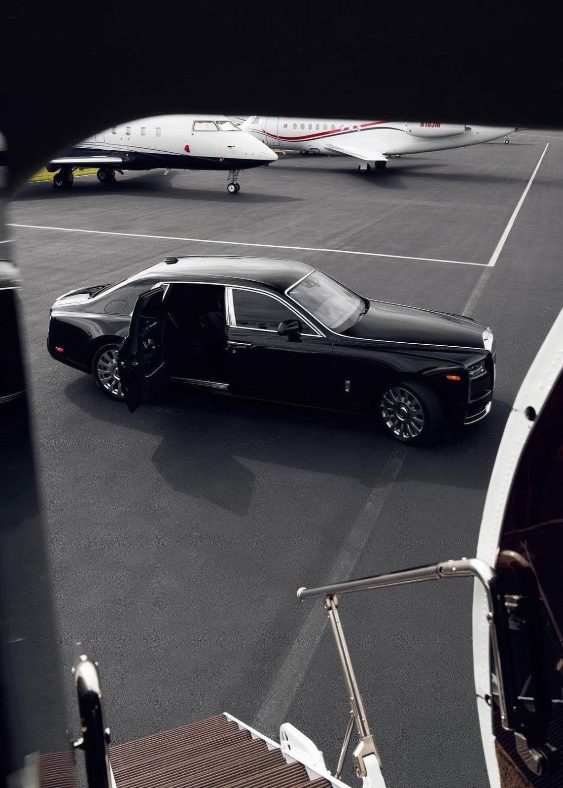 Chauffeured car waiting on the tarmac